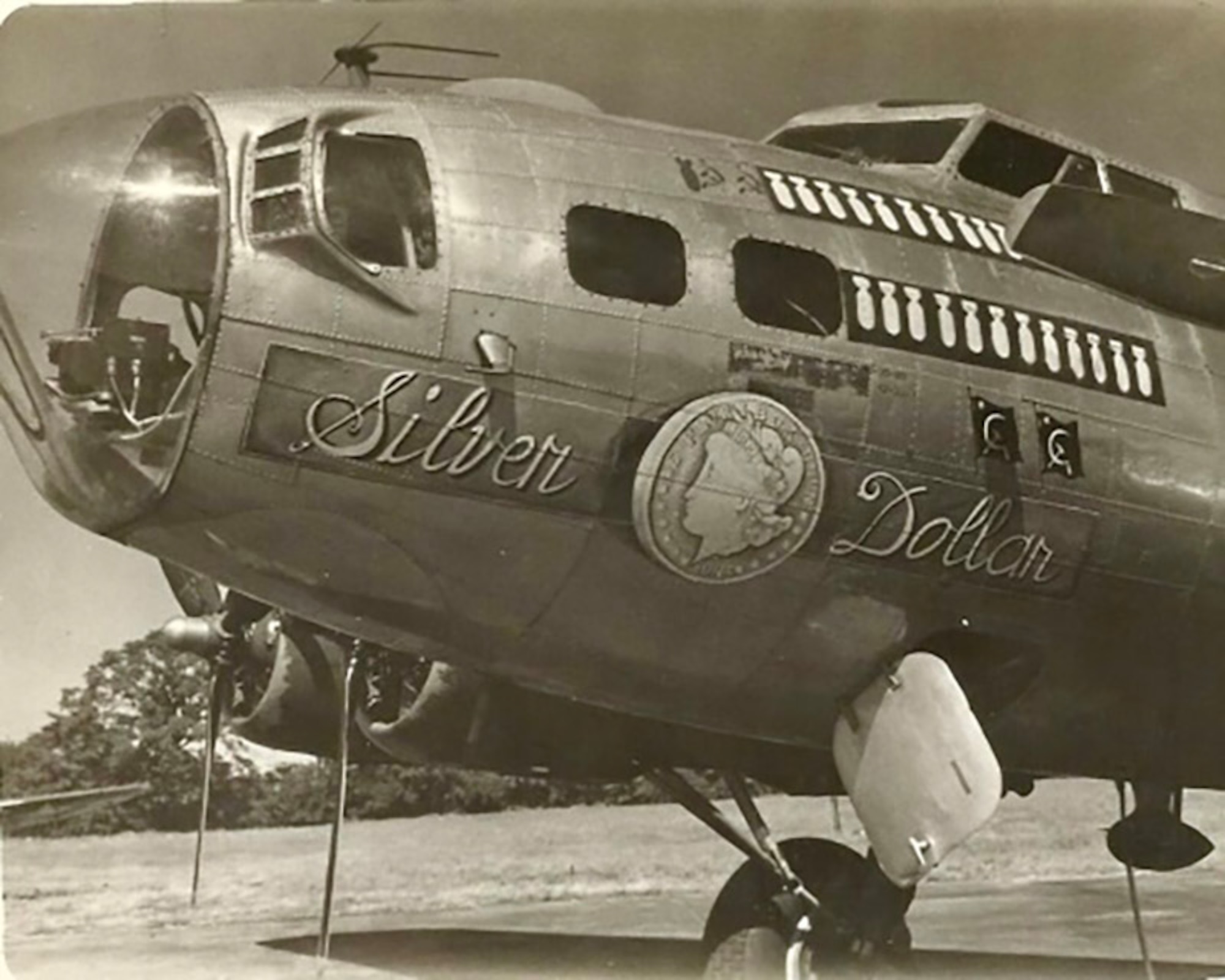 The original “Silver Dollar” nose art from World War II is painted on a B-17 Flying Fortress, tail number 23-2090. Eighty years later, an updated version of it was unveiled on a KC-135 Stratotanker from the 100th Air Refueling Wing, Royal Air Force Mildenhall, England, Oct. 10, 2023. After multiple combat missions, Silver Dollar was hit while taxiing on the ground at Thorpe Abbotts, Norfolk, England, by another B-17 – “Heavenly Angel.” The tail of the second plane was removed and placed on Silver Dollar; the aircraft’s call sign was then changed from ‘D-Dog’ to ‘E-Easy,’ effectively ending the aircraft’s official wartime service with the group. (Courtesy photo from the 100th Bomb Group Foundation archives)