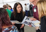 IMAGE: Strategic and Computing Systems Deputy Department head Camille Ward gives a technical overview of the department to university students attending Naval Surface Warfare Center Dahlgren Division’s inaugural Naval Engineering Education Consortium Student Day Oct. 13.