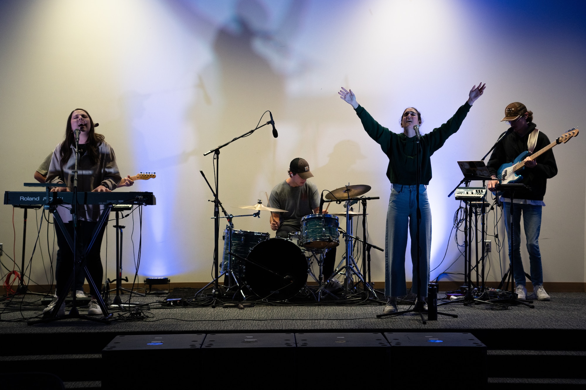 Band members performing on stage