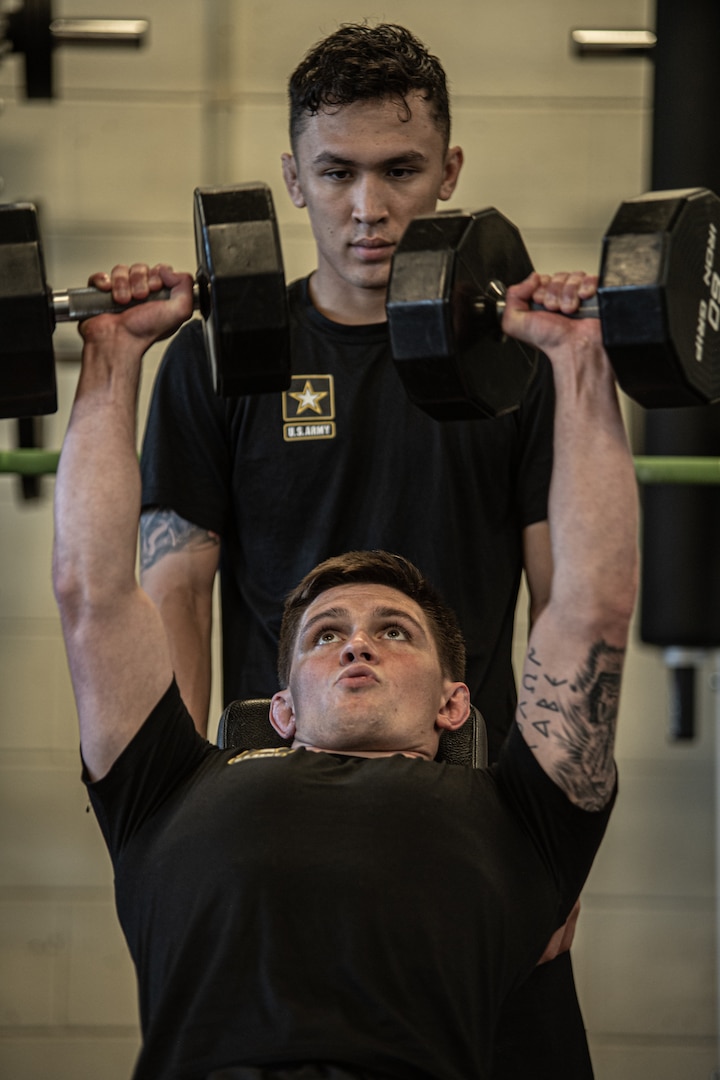 Spc. Dalton Duffield, an Oklahoma Army National Guard Soldier and Moore, Oklahoma native, lifts weights before wrestling practice at Fort Carson, Colorado, Aug. 8, 2023. Duffield is a member of the Oklahoma National Guard and a Greco-Roman wrestler pursuing his Olympic goals through the U.S. Army's World Class Athlete Program. (Oklahoma National Guard photo by Anthony Jones)