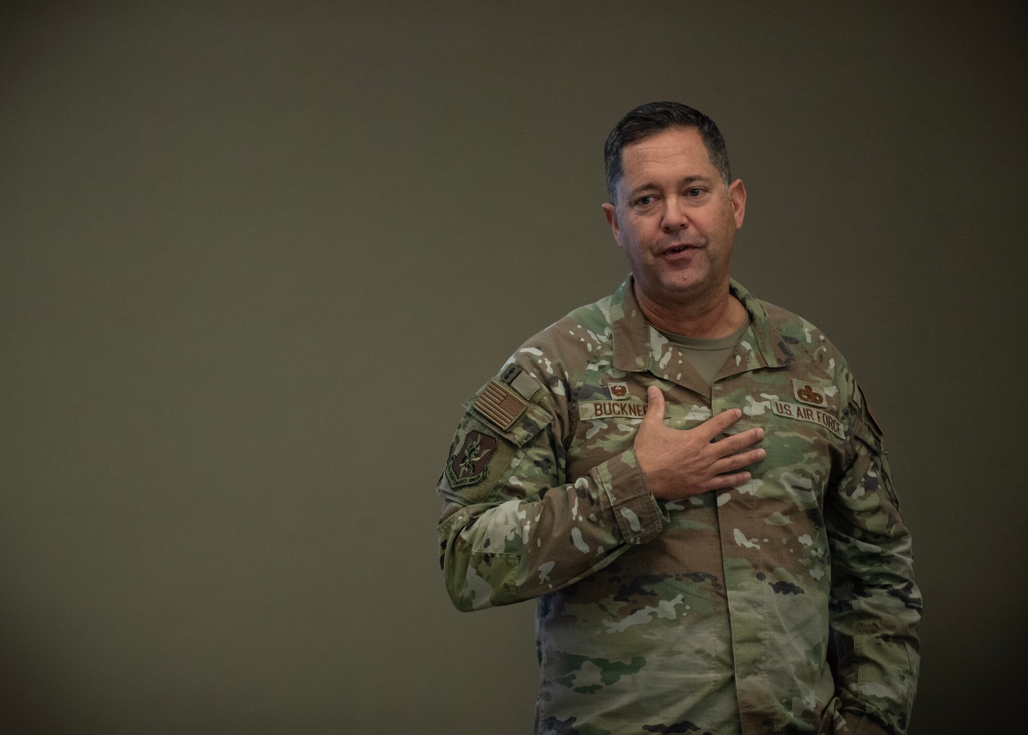 An Airman briefs an audience