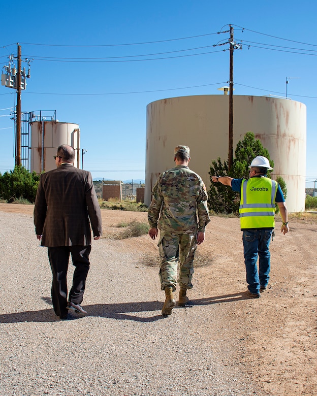 Steve Gallegos, deputy director of utilities, city of Rio Rancho, right, discusses the new water tank with Rio Rancho Mayor Gregg Hull, left, and Albuquerque District Commander Lt. Col. Jerre Hansbrough, during a tour of the new water tank, Aug. 9, 2023.