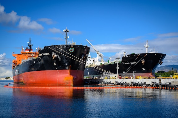 Merchant tanker Empire State receives fuel from Red Hill Bulk Fuel Storage Facility (RHBFSF), as merchant tanker Torm Thunder awaits to receive fuel at Joint Base Pearl Harbor-Hickam, Hawaii, Oct. 17, 2023.