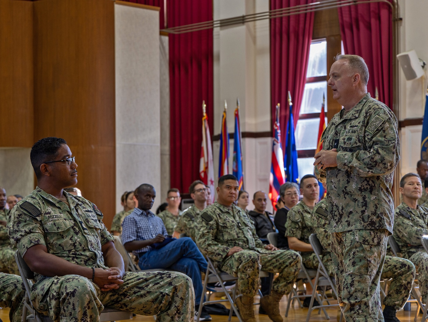 Acting Surgeon General Rear Admiral Darin K. Via answers questions from Sailors and staff from United States Navy Hospital Yokosuka
