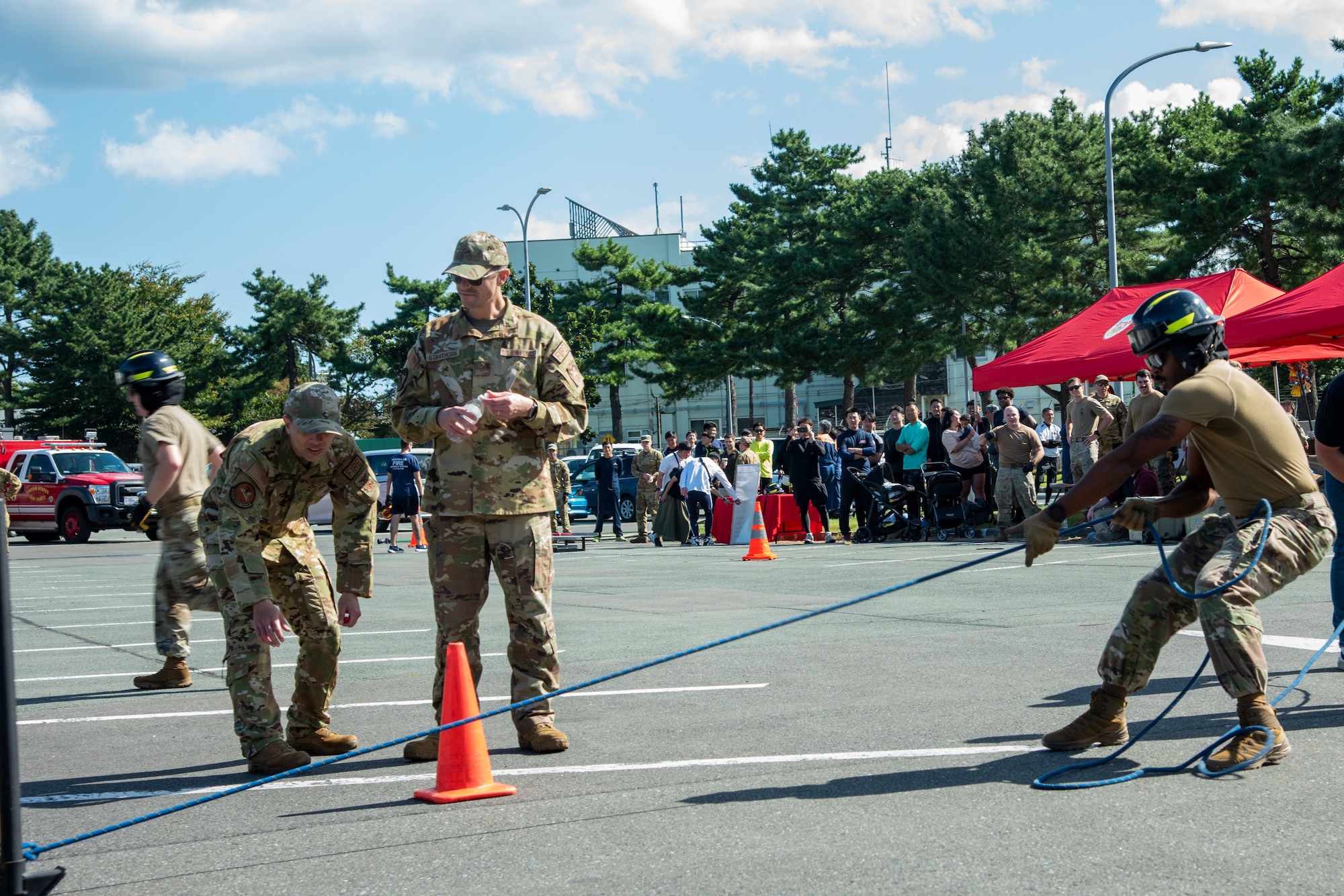 U.S. Air Force 35th Civil Engineer Squadron firefighter pulls a weighted sled during the Misawa Air Base Fire Muster at Misawa Air Base, Japan, Oct. 12, 2023.