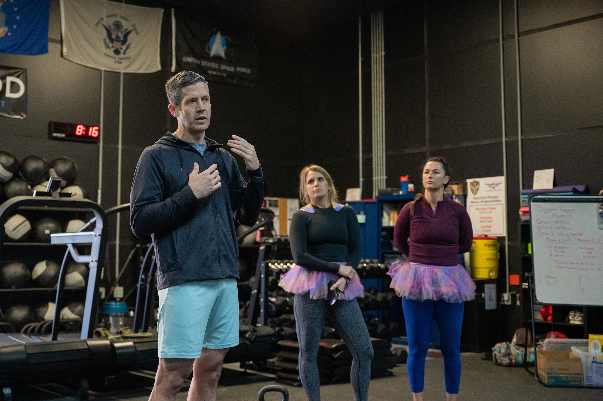 U.S. Air Force Col. William McKibban, 51st Fighter Wing commander, provides opening remarks during a Domestic Violence Awareness Month workout at Osan Air Base, Republic of Korea, Oct. 14, 2023. The event was designed to highlight the issue of domestic violence within the U.S. Air Force, offering a platform to share resources to the base. (U.S. Air Force photo by Staff Sgt. Thomas Sjoberg)