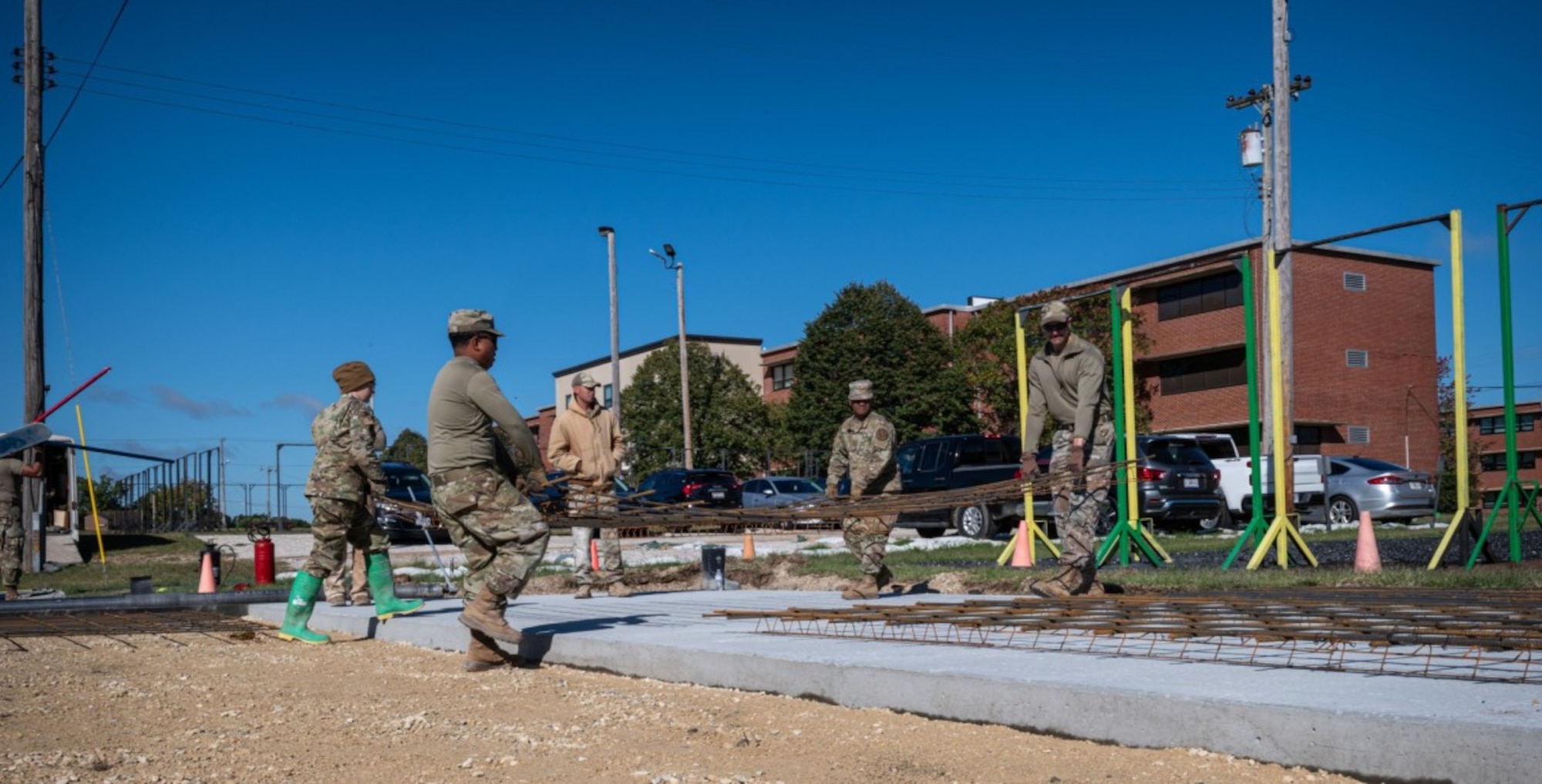 Airmen press and smooth concrete.