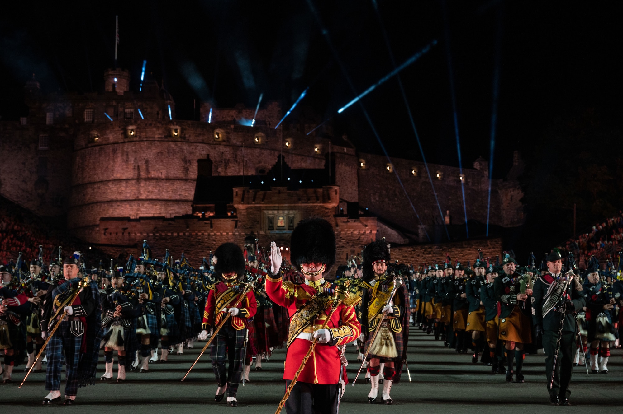 The Massed Pipes and Drums march off the esplanade during the finale of The Royal Edinburgh Military Tattoo held at Edinburgh Castle, Scotland, Aug. 23, 2023. U.S. Air Force Senior Master Sgt. Adam Tianello of The U.S. Air Force Band performed with the Tattoo’s Pipes and Drums alongside bagpipers from around the world. Military tattoos are a historic tradition symbolizing the camaraderie and mutual respect shared among each nations’ armed forces and showcasing the excellence of their service members. (U.S. Air Force photo by Kristen Wong)
