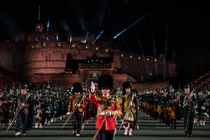 The Massed Pipes and Drums march off the esplanade during the finale of The Royal Edinburgh Military Tattoo held at Edinburgh Castle, Scotland, Aug. 23, 2023. U.S. Air Force Senior Master Sgt. Adam Tianello of The U.S. Air Force Band performed with the Tattoo’s Pipes and Drums alongside bagpipers from around the world. Military tattoos are a historic tradition symbolizing the camaraderie and mutual respect shared among each nations’ armed forces and showcasing the excellence of their service members. (U.S. Air Force photo by Kristen Wong)