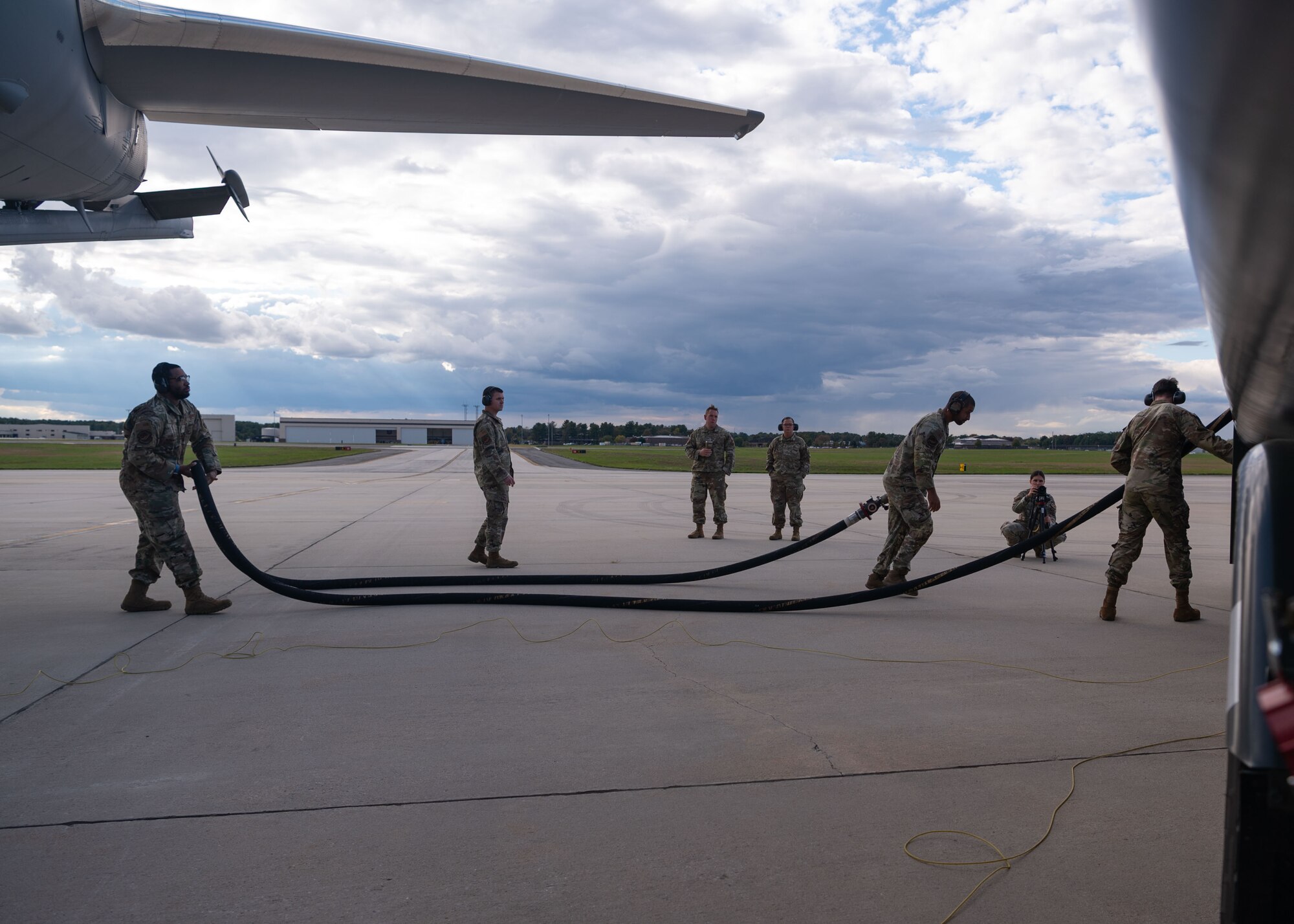 U.S. Air Force Airmen assigned to the 87th Logistics Readiness Squadron and the 305th Air Mobility Wing conduct a hot pit refueling at Joint Base McGuire-Dix-Lakehurst, N.J., Oct. 17, 2023. This event marked the first time the 305th AMW Airmen executed the Special Fuels Operation, which is instrumental to Agile Combat Employment objectives and increases operational capabilities. (U.S. Air Force photo by Staff Sgt. Monica Roybal)