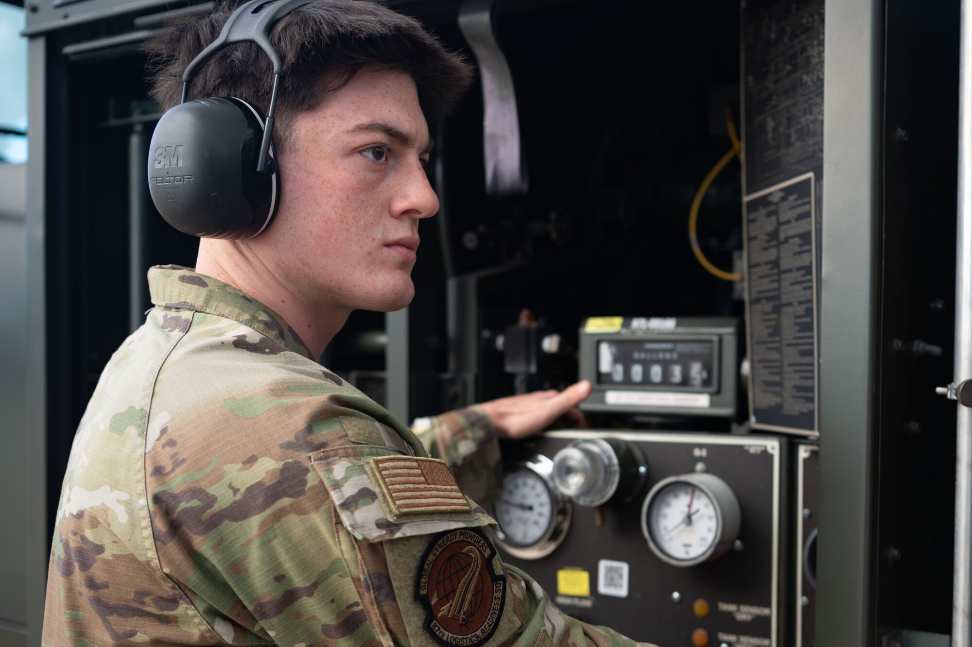 U.S. Air Force Airman 1st Class Mark Gottschalk, 87th Logistics Readiness Squadron Fuels Flight fuels distribution operator, initiates refueling procedures at Joint Base McGuire-Dix-Lakehurst, N.J., Oct. 17, 2023. This event marked the first time the 305th Air Mobility Wing Airmen executed the Special Fuels Operation, which is instrumental to Agile Combat Employment objectives and increases operational capabilities. (U.S. Air Force photo by Staff Sgt. Monica Roybal)