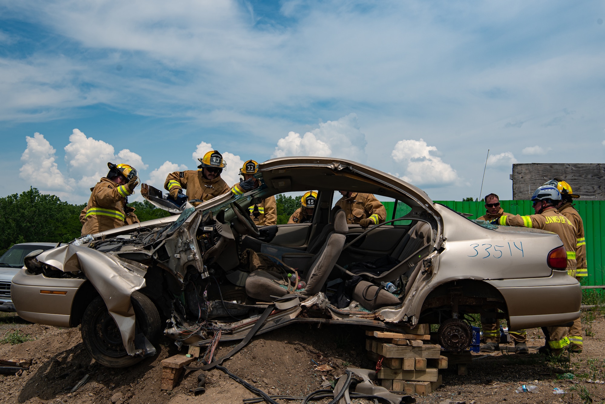 Fire fighters from the 110th Civil Engineering Squadron practice using hydraulic rescue tools at Battle Creek Air National Guard Base, Mich., Jun. 3, 2023. The training exercise helps members understand how they work.