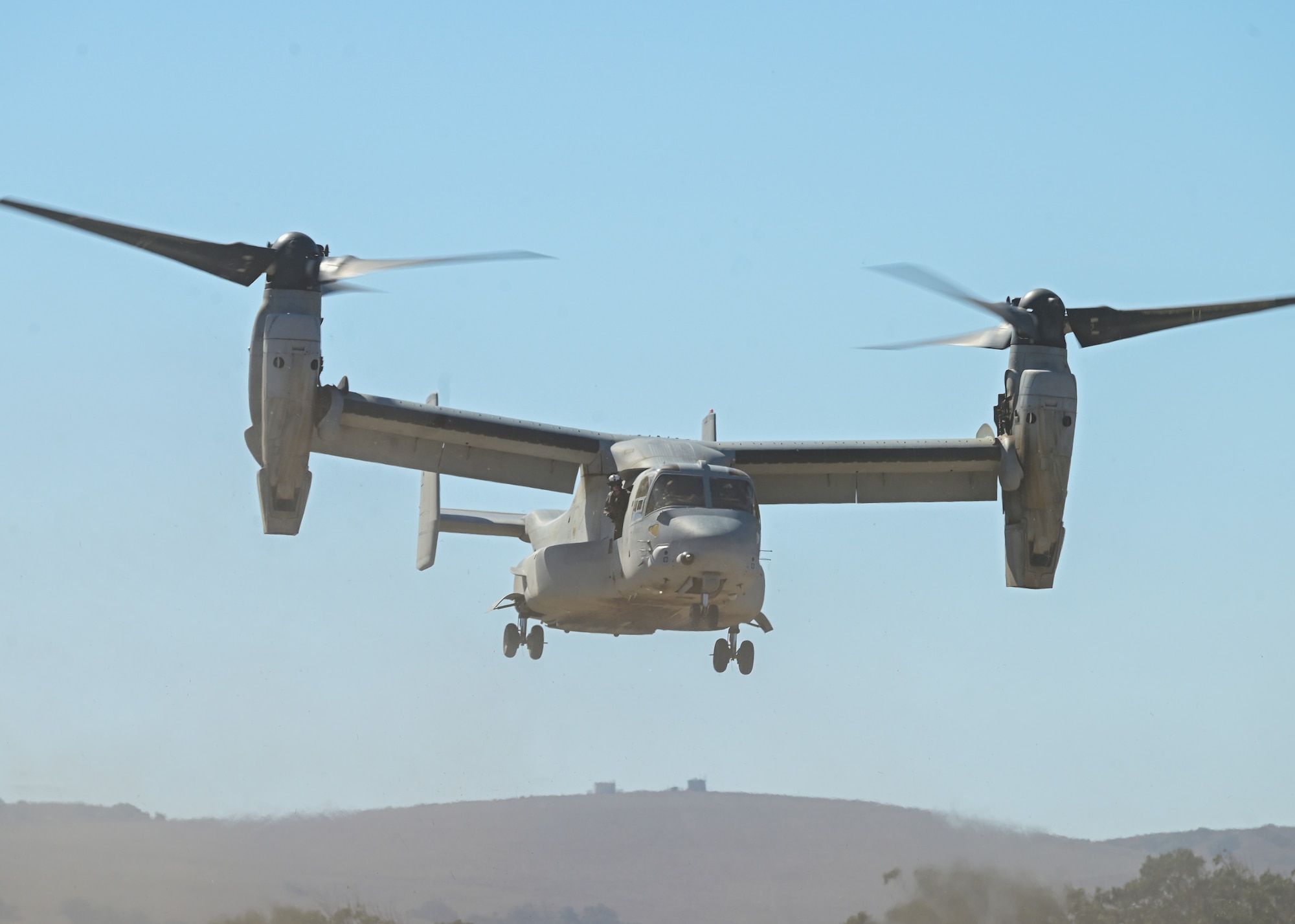 An aircraft maneuvers through the sky.