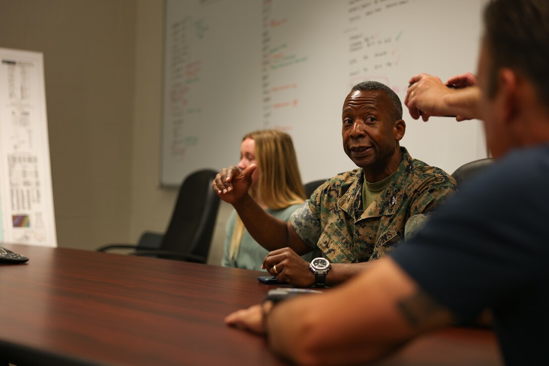 U.S. Marine Corps Col. Michael L. Brooks, base commander, Marine Corps Base Quantico, a native of South Boston, Virginia, speaks with visiting journalists on MCBQ, Virginia, Aug. 31, 2023. Journalists from local media outlets toured Quantico's firing ranges to better understand how Marine Corps Base Quantico supports training for its tenant and adjacent commands. Journalists also had the opportunity to speak to Col. Michael L. Brooks, base commander, MCBQ, about the many ways the base partners with the surrounding counties. (U.S. Marine Corps photo by Lance Cpl. David Brandes)