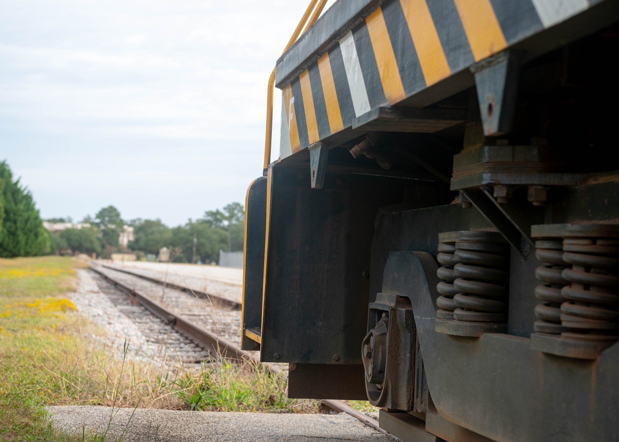 Close up image of train and railroad tracks.