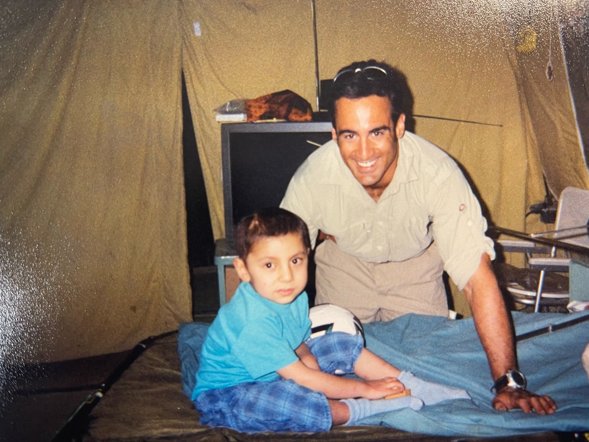Tech. Sgt. Ramón "CZ" Colón-López stops for a photo during one of his first deployments at the beginning of Operation Enduring Freedom, 2002. (Courtesy photo)