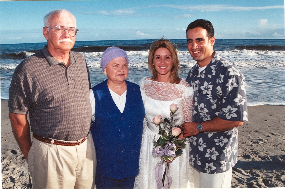 Ramón "CZ" Colón-López, Janet Colón and her parents, Bill and Sally McCaskill, pose for a photo on their wedding day, Nov. 21, 1999. (Courtesy photo)