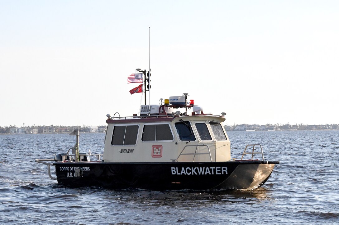 The U.S. Army Corps of Engineers uses the Hydro survey vessel "Blackwater" on the water near Fort Myers, Fla. Oct. 5, 2022 to survey vessel paths of debris and sunken ships. The vessel cleared the path for all vehicles before they could enter the Fort Myers Harbor.