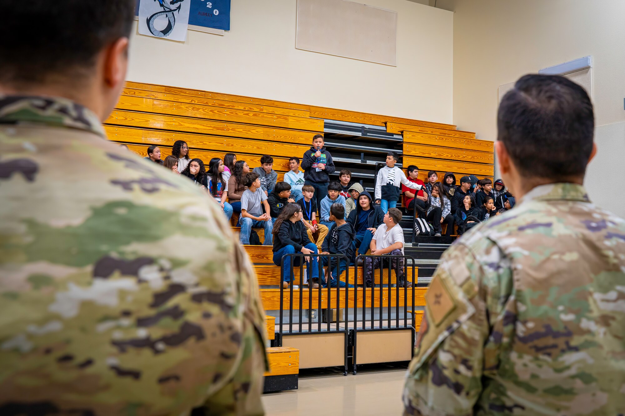 Student ask a military members a question.