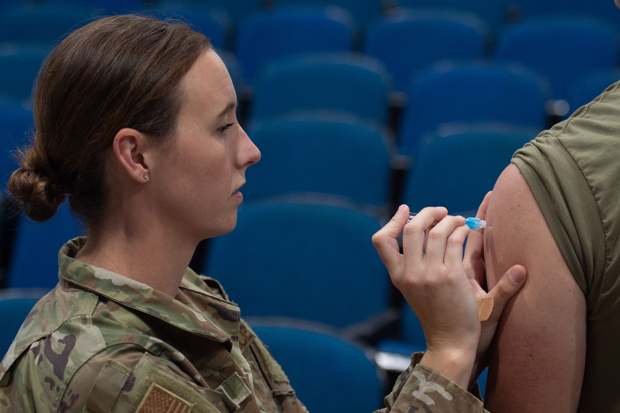 A U.S. Air Force Airman, assigned to the 23rd Medical Group, administers a vaccination at Moody Air Force Base, Georgia, Oct.18, 2023. The MDG administered roughly 2,000 vaccinations to Airmen during a two-day period. (U.S. Air Force photo by Airman Cade Ellis)