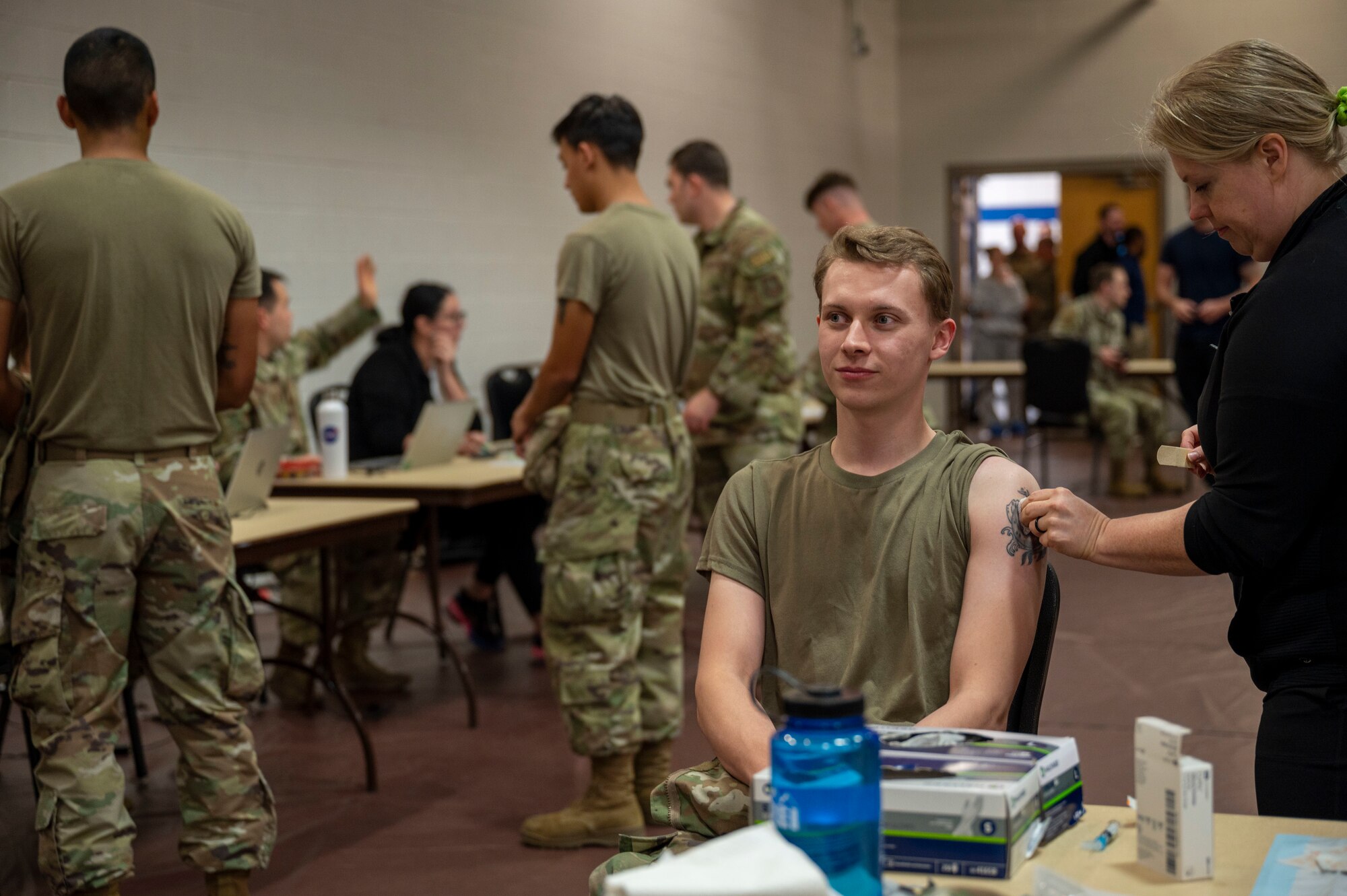 Airmen assigned to McConnell Air Force Base, Kansas, receive their annual influenza vaccinations Oct. 19, 2023, at McConnell. The 22nd Medical Group held a three-day campaign to ensure all Active Duty, Guard, Reserve and civilian personnel received their annual flu shot. (U.S. Air Force photo by Airman 1st Class Gavin Hameed)