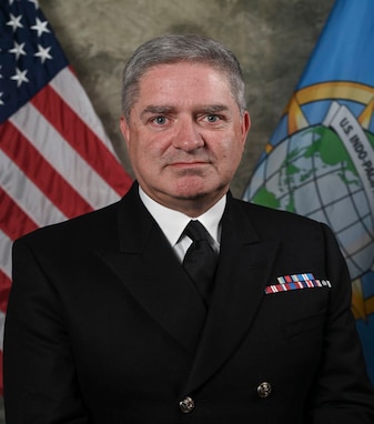 Official portrait of Commodore Jonathan Lett, Royal Navy.