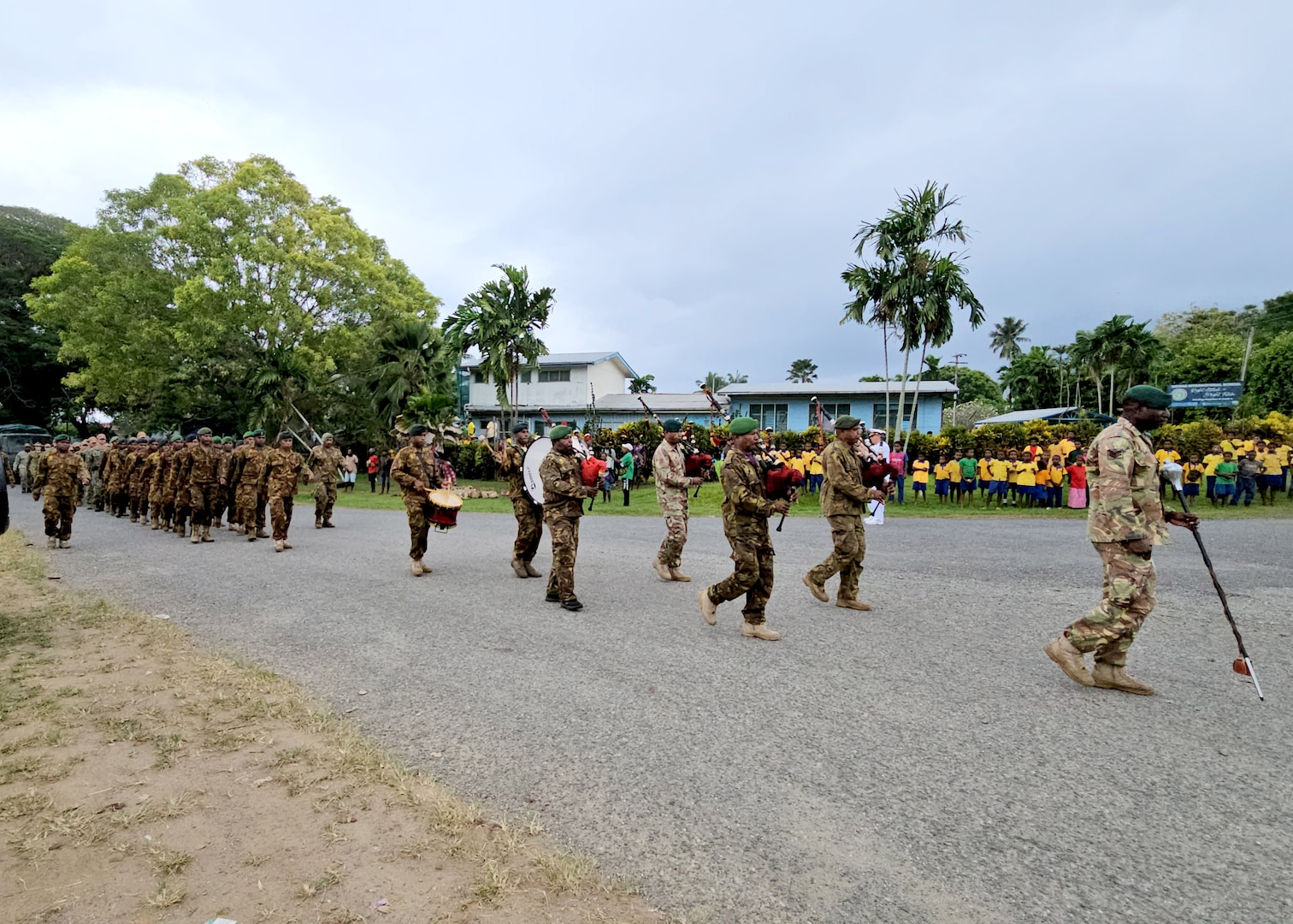 WEWAK, Papua New Guinea (Oct. 20, 2023) – Papua New Guinea Defense Force service members lead a parade through Wewak to the Pacific Partnership 2023 PNG closing ceremony, Oct. 20. Now in its 18th year, Pacific Partnership is the largest annual multinational humanitarian assistance and disaster relief preparedness mission conducted in the Indo-Pacific. (U.S. Navy photo by Chief Mass Communication Specialist Kegan E. Kay)