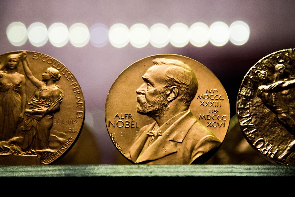 Close-up of Nobel prize coins.