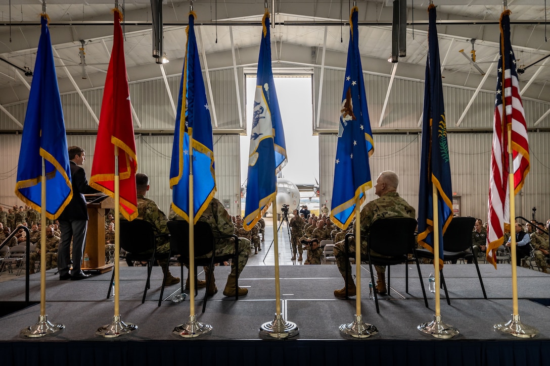 Kentucky Gov. Andy Beshear, left, speaks to members of the 123rd Airlift Wing during an award ceremony at the Kentucky Air National Guard Base in Louisville, Ky., Oct. 14, 2023. The unit received its 20th Air Force Outstanding Unit Award and a Meritorious Unit Award for superior achievement in a broad spectrum of missions around the world since 2019. (U.S. Air National Guard photo by Dale Greer)