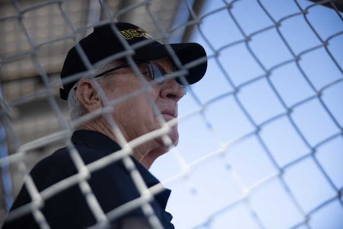 A veteran of Marine Fighter Attack Squadron-235 observes India Company, 3rd Recruit Battalion graduation ceremony at Marine Corps Recruit Depot San Diego, Oct. 20, 2023. VMFA-235 participated in action during World War II, the Vietnam War, Operation Desert Storm, and was decommissioned on June 14, 1996. Veterans of VMFA-235 visited MCRD San Diego to observe the graduation of new U.S. Marines in to promote and reinforce customs, history, and Marine Corps traditions. (U.S. Marine Corps photo by Cpl. Elliott A. Flood-Johnson)