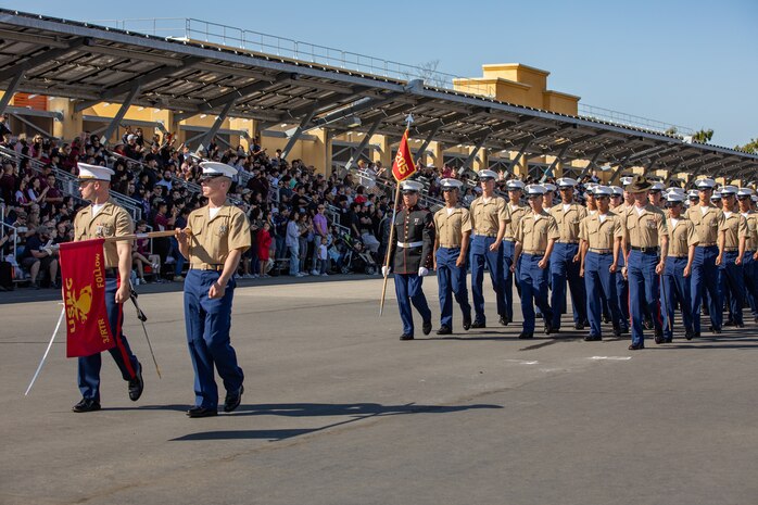 New U.S. Marines with India Company, 3rd Recruit Training Battalion, march across the parade deck during their graduation ceremony at Marine Corps Recruit Depot San Diego, Oct. 20, 2023. Graduation took place at the completion of the 13-week transformation, which included training for drill, marksmanship, basic combat skills, and Marine Corps customs and traditions. (U.S. Marine Corps photo by Lance Cpl. Sarah M. Grawcock)