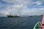 The Harvey Challenger arrives on scene with the Bonnie G to begin fuel removal operations off Cyril E. King Airport, St. Thomas, Oct. 22, 2023. The Harvey Challenger is from Louisiana. (U.S. Coast Guard photo by Petty Officer 1st Class Nicole J. Groll)