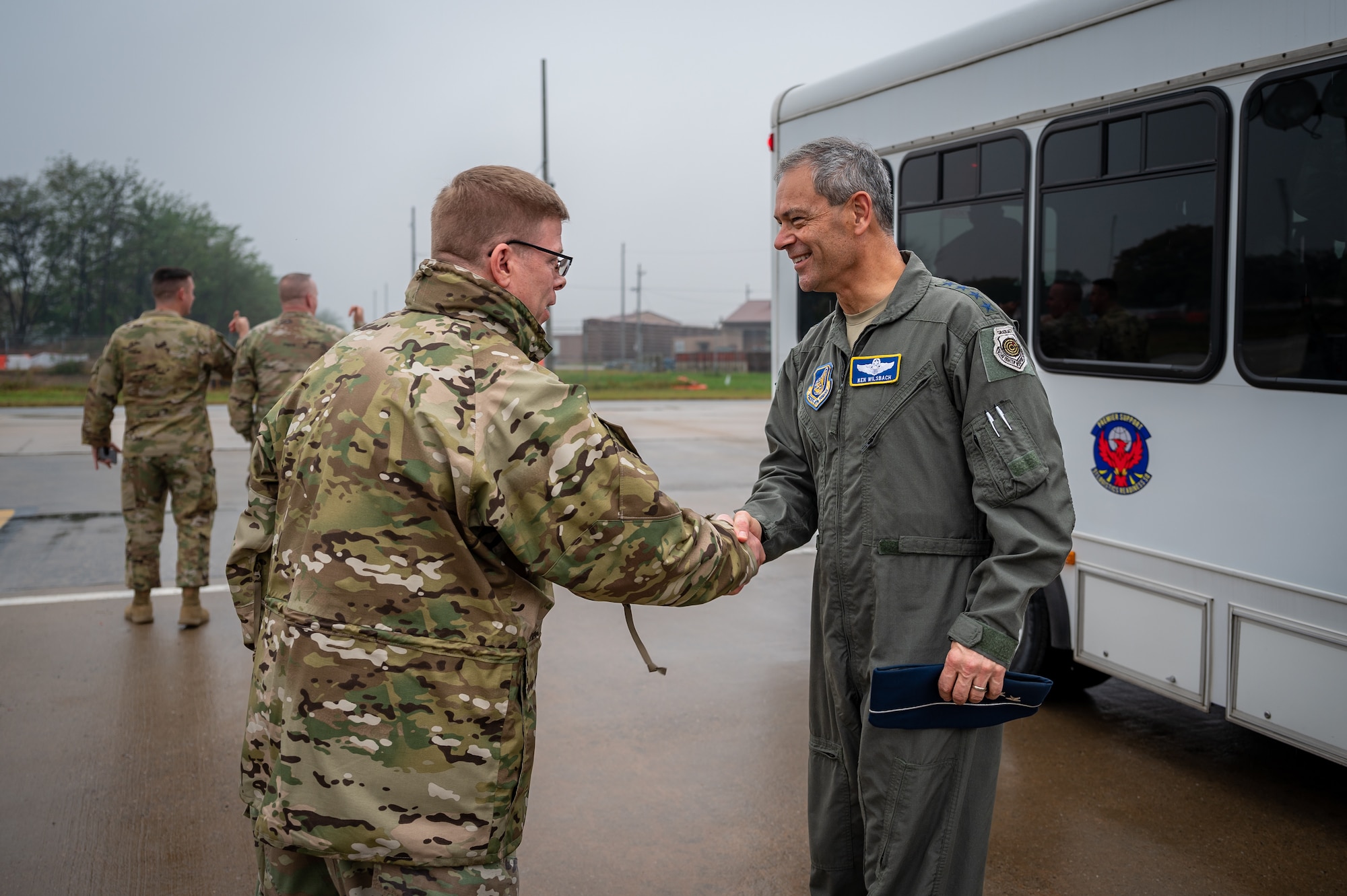 U.S. Air Force Gen. Ken Wilsbach, Pacific Air Forces commander, is met by Lt. Col. Brian Myers, 51st Munitions Squadron commander, during a PACAF command team visit at Osan Air Base, Republic of Korea, Oct. 19, 2023.