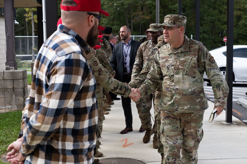 Two men shaking hands.