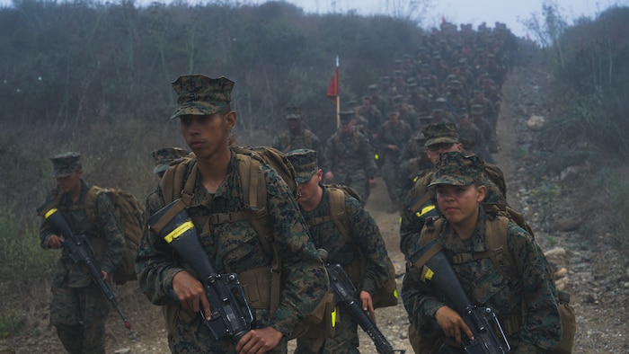 U.S. Marines with Hotel Company, 2nd Recruit Training Battalion, march in formation during the crucible, at Marine Corps Base Camp Pendleton, California, Oct. 18, 2023. The Eagle, Globe, and Anchor ceremony is the final event of the Crucible and represents the transformation of recruit to a United States Marine. (U.S. Marine Corps photo by Lance Cpl. Francisco Angel)