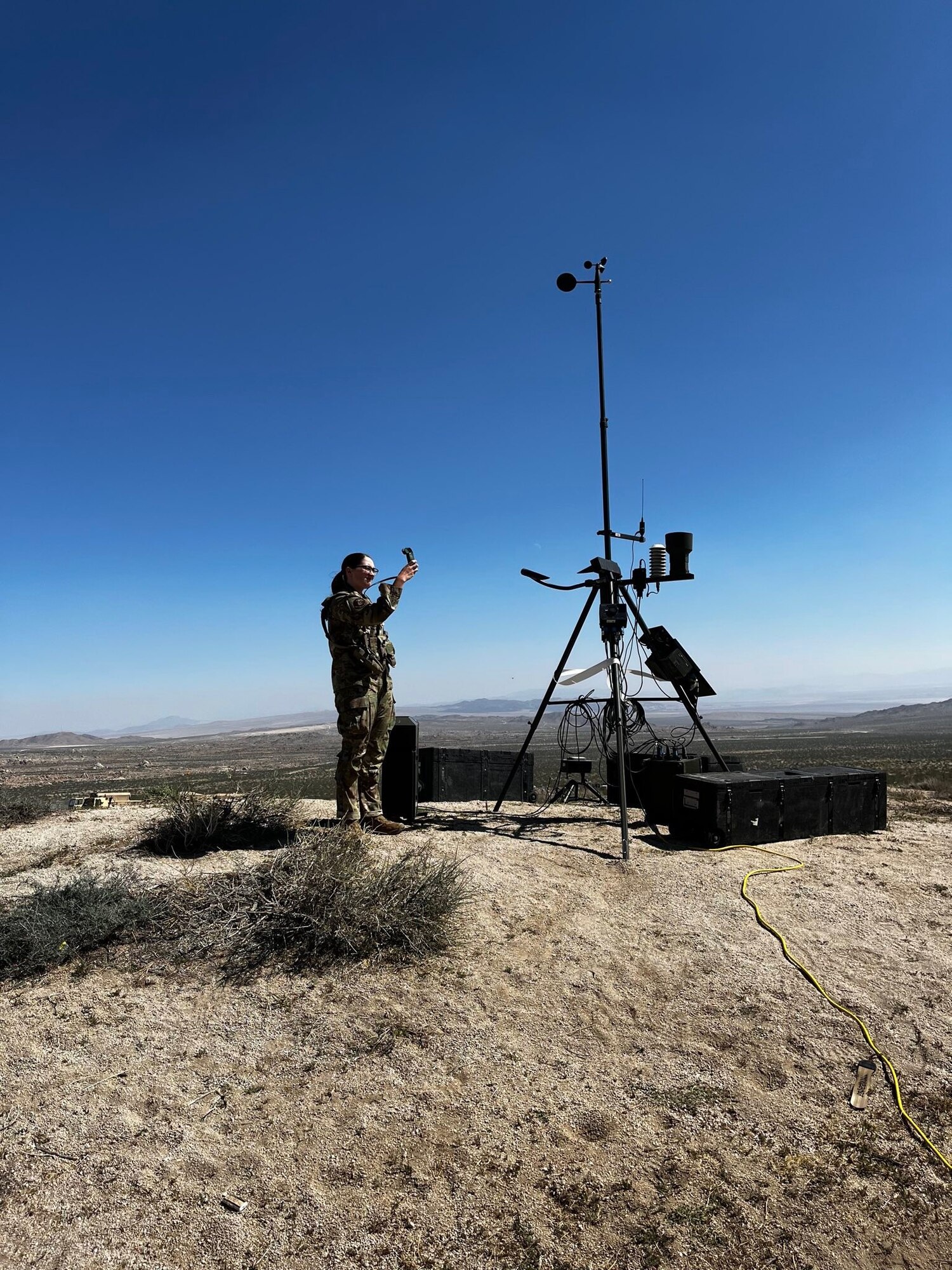 An Airman uses weather equipment