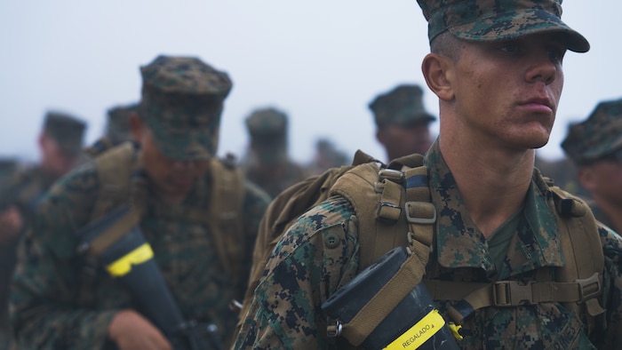 U.S. Marines with Hotel Company, 2nd Recruit Training Battalion, march in formation during the crucible, at Marine Corps Base Camp Pendleton, California, Oct. 18, 2023. The Eagle, Globe, and Anchor ceremony is the final event of the Crucible and represents the transformation of recruit to a United States Marine. (U.S. Marine Corps photo by Lance Cpl. Francisco Angel)