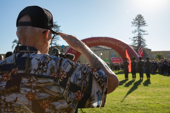 Retired U.S. Marine Corps Major Billy Hall, a veteran of World War II, the Korean War, and the Vietnam War, salutes the colors during the opening ceremony of the Boot Camp Challenge at Marine Corps Recruit Depot San Diego, Oct. 21, 2023. For the past 21 years the Boot Camp Challenge has offered a unique opportunity to the public to step into the shoes of a future Marine, guided by drill instructors to conquer a three-mile obstacle race and gain experience into what recruits go through during boot camp. (U.S. Marine Corps photo by Lance Cpl. Sarah Grawcock)