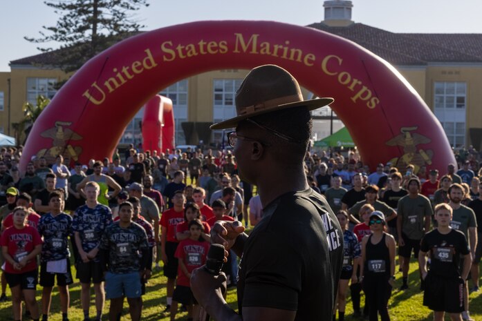 U.S. Marine Corps Staff Sgt. Joshua Mollie, a drill instructor with Recruit Training Regiment, addresses the participants of the Boot Camp Challenge at Marine Corps Recruit Depot San Diego, Oct. 21, 2023. For the past 21 years the Boot Camp Challenge has offered a unique opportunity to the public to step into the shoes of a future Marine, guided by drill instructors to conquer a three-mile obstacle race and gain experience into what recruits go through during boot camp. (U.S. Marine Corps photo by Cpl. Alexander O. Devereux)