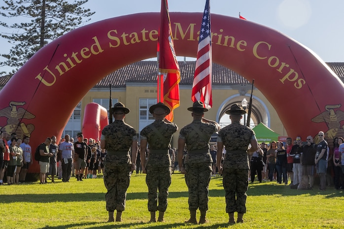 U.S. Marines with the Marine Corps Recruit Depot San Diego color guard, present the colors during the opening ceremony of the Boot Camp Challenge, at Marine Corps Recruit Depot San Diego, Oct. 21, 2023. For the past 21 years the Boot Camp Challenge has offered a unique opportunity to the public to step into the shoes of a future Marine, guided by drill instructors to conquer a three-mile obstacle race and gain experience into what recruits go through during boot camp. (U.S. Marine Corps photo by Cpl. Alexander O. Devereux)