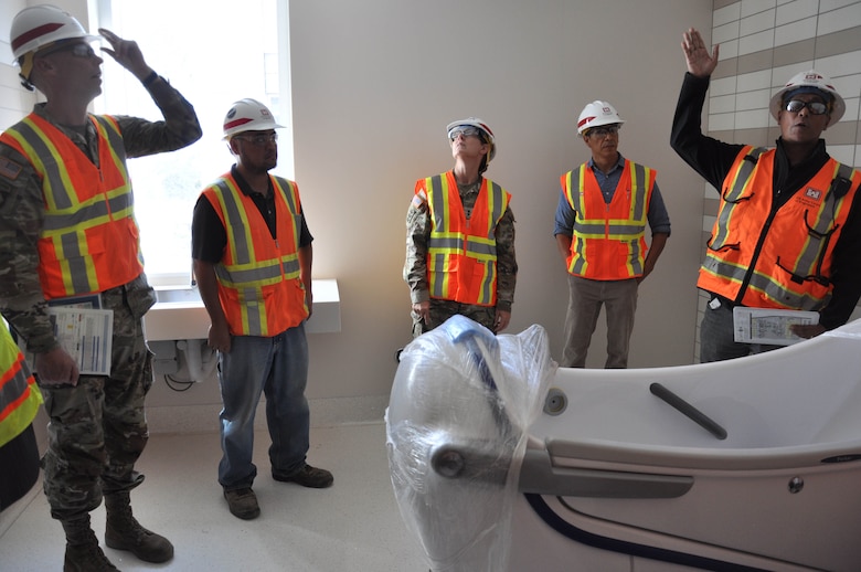 Maj. Gen. Kimberly Colloton, U.S. Army Corps of Engineers deputy commanding general for Military and International Operations receives a description of details going into a Veterans Affairs Long Beach Healthcare System patient bathing room Oct. 12 in Long Beach, Calif.