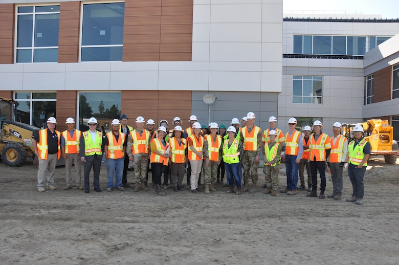 U.S. Army Corps of Engineers, Veterans Affairs and contractors pose for a photo at the Veterans Affairs Long Beach Healthcare System project site Oct. 12 in Long Beach, Calif.