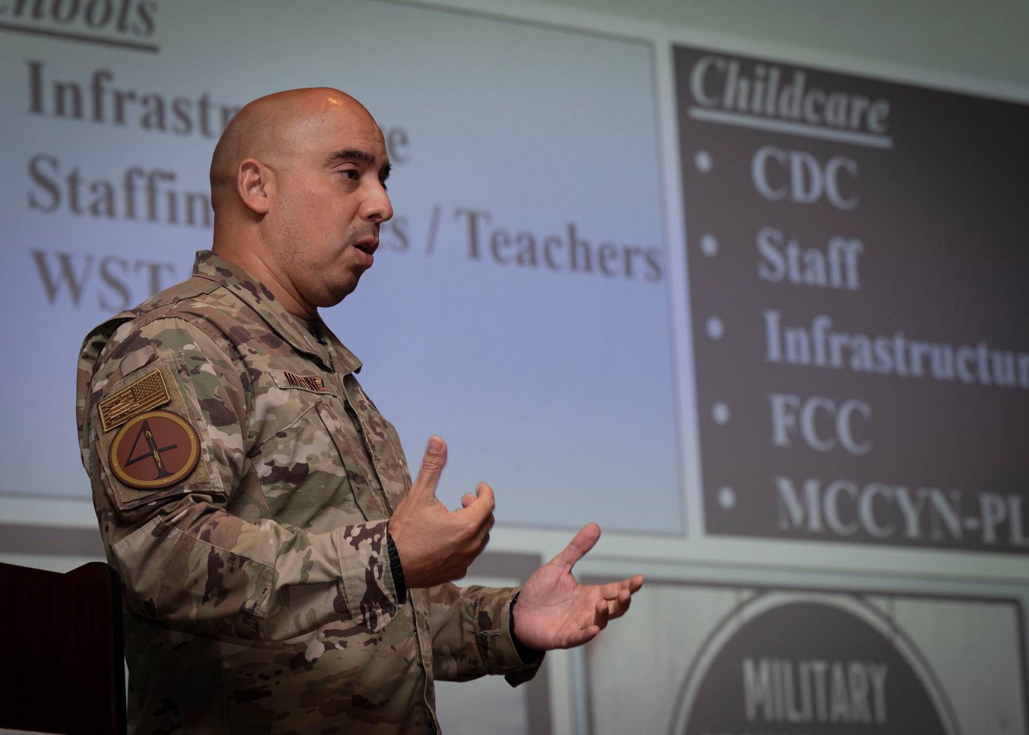 Chief Master Sgt. Peter Martinez, 4th Fighter Wing command chief, speaks during a commander’s all call at Seymour Johnson Air Force Base, North Carolina, Oct. 19, 2023. The all call highlighted the wing's initiatives and upcoming changes. (U.S. Air Force photo by Senior Airman Sabrina Fuller)