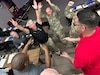 Readiness Training Academy Sgt. Maj. William J. Angelo celebrates winning his team's Rock, Paper, Scissors Challenge, during Master Resilience Training, Oct. 13, 2023, at Fort Knox, KY. (U.S. Army photo by Maj. Tyler G Mitchell)