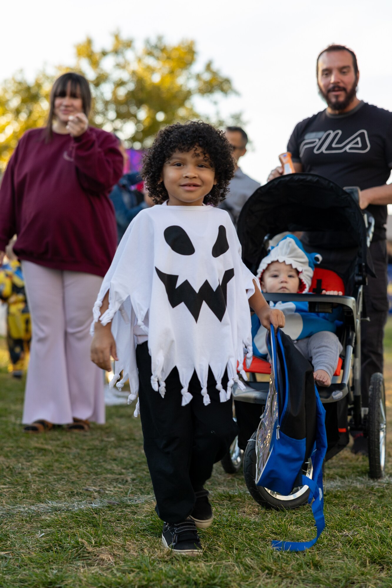 Kids in costume with parents