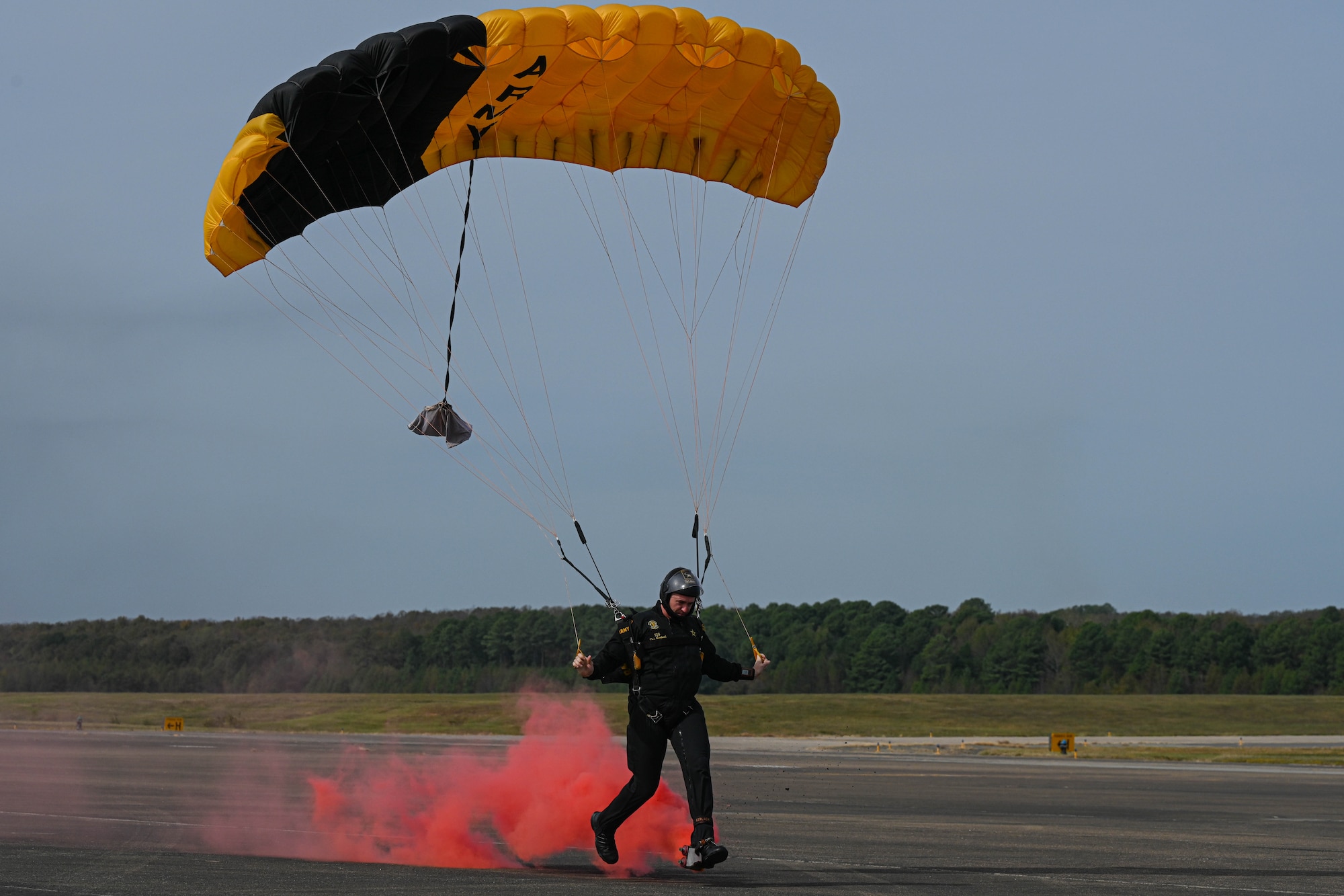 A U.S. Army Golden Knights member performs a parachute jump.