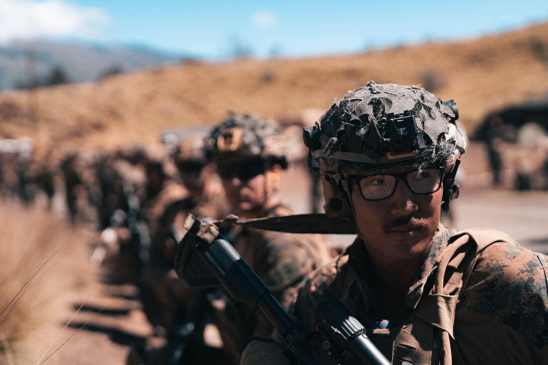 U.S. Marines with 3d Littoral Combat Team, 3d Marine Littoral Regiment, 3d Marine Division, conduct a platoon attack at Pohakuloa Training Area, Oct. 17, 2023. Prior to participating in Joint Pacific Multinational Readiness Center Exercise from Oct. 26 – Nov. 9, a company of Marines with 3d LCT is conducting the final phase of their training work-up cycle on the Big Island, Hawaii. (U.S. Marine Corps photo by Cpl. Eric Huynh)