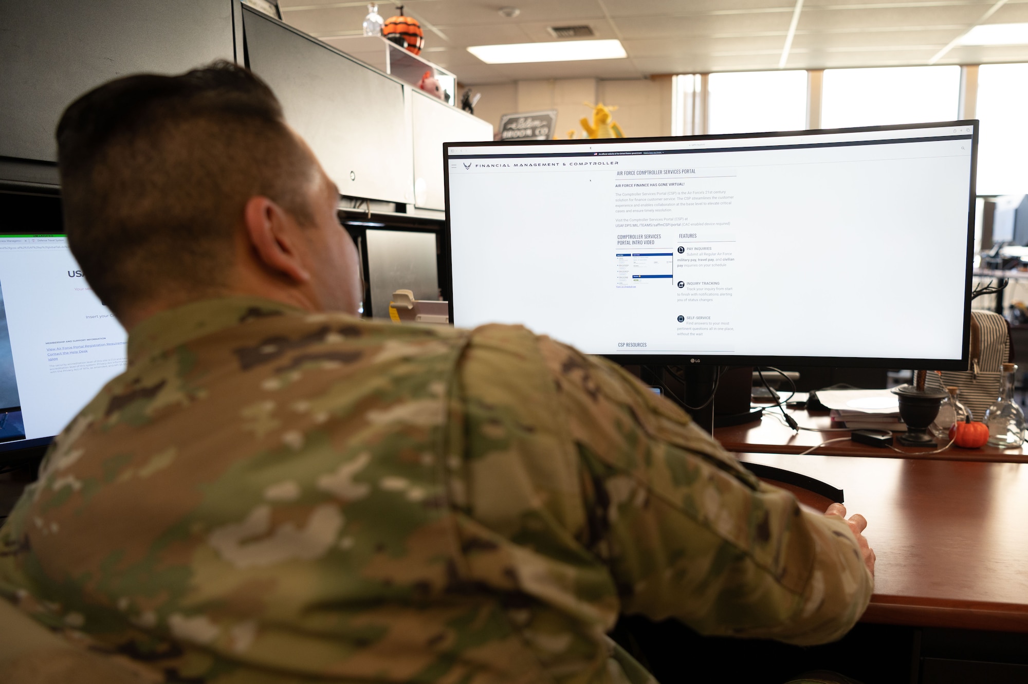 An Airman from Joint Base Elmendorf-Richardson uses the Comptroller Services (CPS) Portal to access online financial information on Joint Base Elmendorf-Richardson, October 23, 2023.
