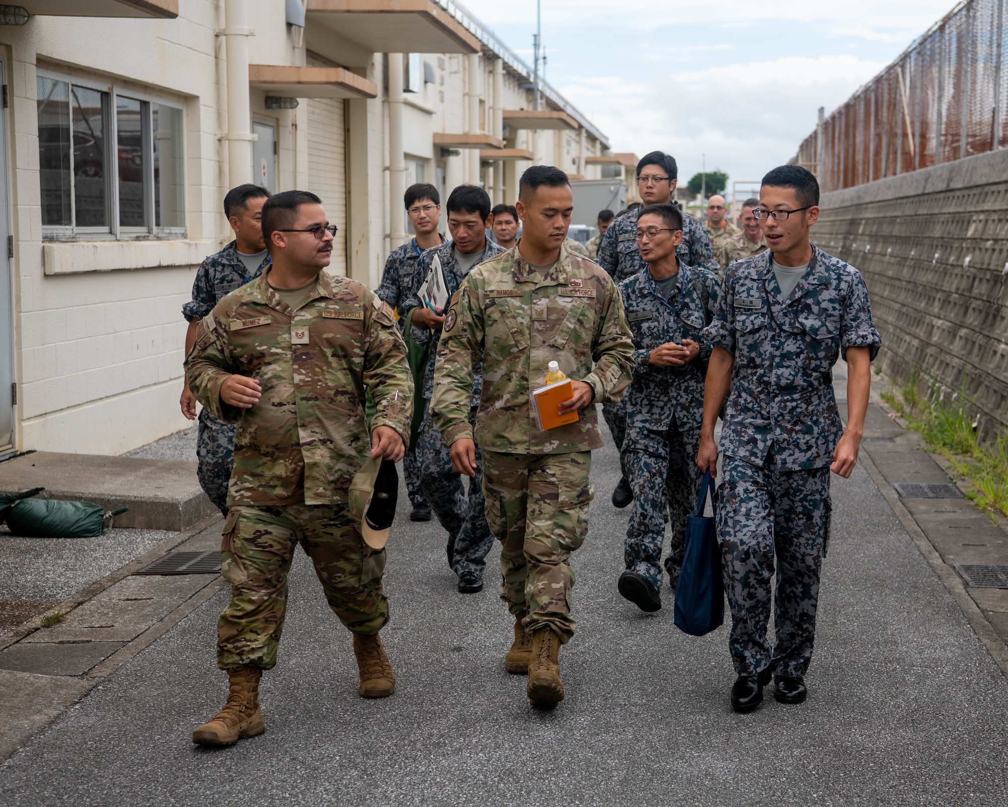 18th Wing EMS walk with JASDF members to the flightline
