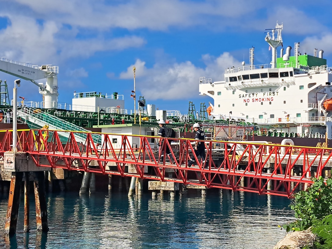 Marine inspectors from the U.S. Coast Guard Forces Micronesia/Sector Guam, under the authority of the Captain of the Port Guam, conduct a Certificate of Compliance (COC) examination and Port State Control inspection on the tank vessel Cindy Glory while in Guam, on Sept. 22, 2023. This inspection marked a significant milestone as it was the vessel's first COC and first time in U.S. waters. The Cindy Glory, a state-of-the-art 600-foot tanker built in 2023 and flagged out of the Republic of the Marshall Islands, underwent rigorous scrutiny during the inspection, where no deficiencies were found. (U.S. Coast Guard photo by Petty Officer 2nd Class Ben Smits)